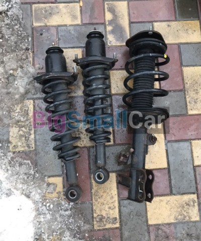 Амортизатор Geely Emgrand EC7