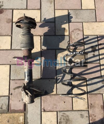 Амортизатор левый nissan almera н 16